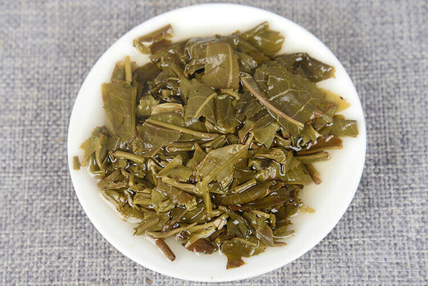 Pu'er Tea  Spring Tea Ancient Tree Tea Yunnan Seven Seed Cake Tea 357g