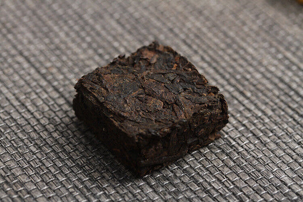Menghai Pu'er ripe tea small square brick tea leaves sinensis word Pu'er tuocha