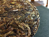 357g Pu'er raw tea golden leaves golden Mengku yellow slices, seven seed cakes