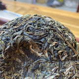 100g - Xi Gui Raw Tea with Orchid Aroma Yunnan Pu-erh Tea Cake