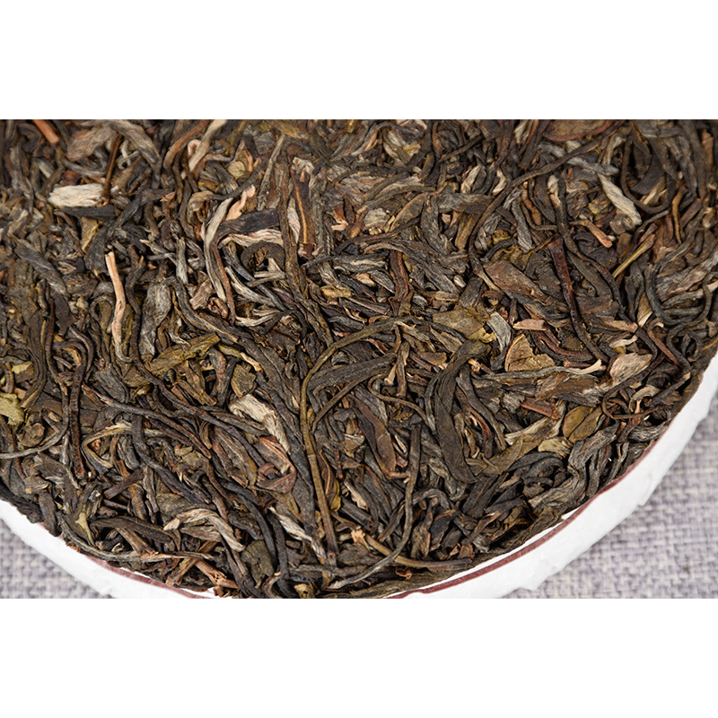 Fenghuang Wo Seven Seeds Cake Spring Tea Tea Cake 357 Organic Green Tea Yiwu