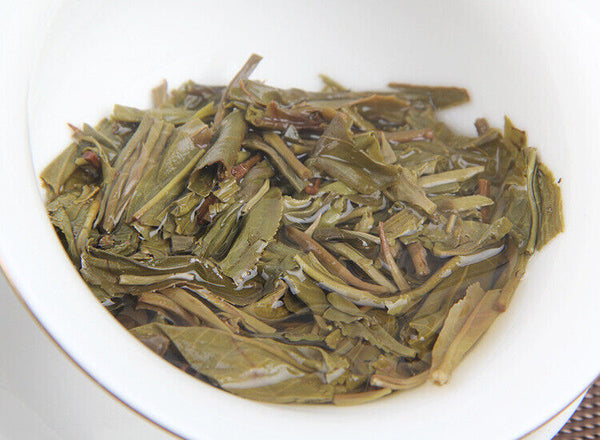 100g/cake Yunnan Pu'er raw tea cake Xigui wilderness tea Icelandic tea