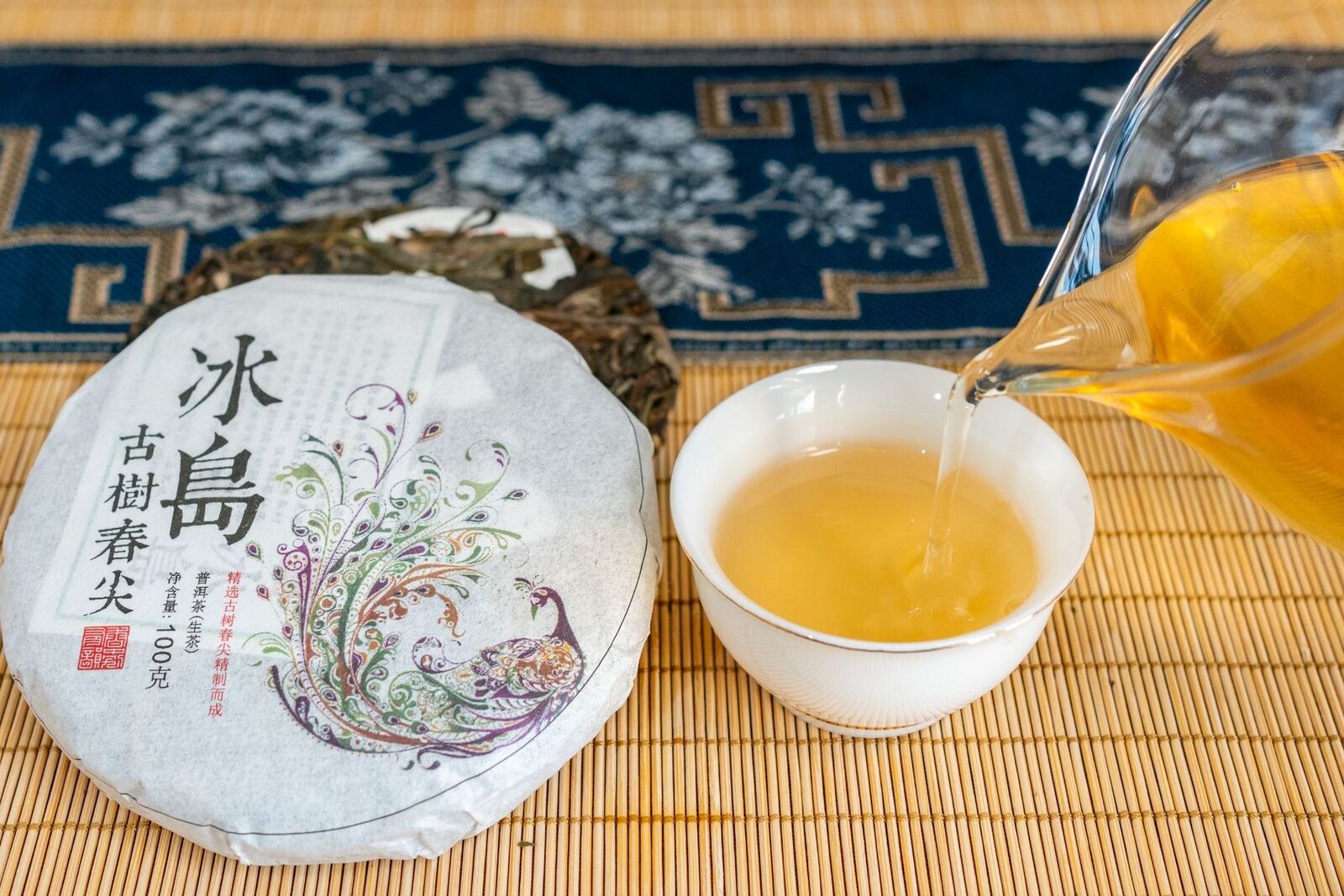 100g Pu'er Raw Tea Iceland Yunnan Ancient Tea Spring Tea Cake Orchid Fragrance