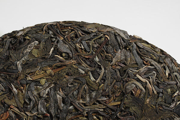 Xigui Desert Mountain Tea Cake Spring Tea 357g Seven Cakes Tea Yunnan Pu'er Tea