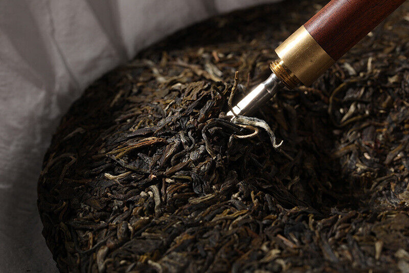 Yunnan Pu'er Tea Yiwu Ancient Tree 357g Pu'er Raw Tea Cake with Orchid Aroma