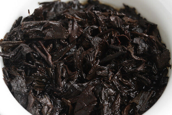 Menghai Pu'er ripe tea small square brick tea leaves sinensis word Pu'er tuocha