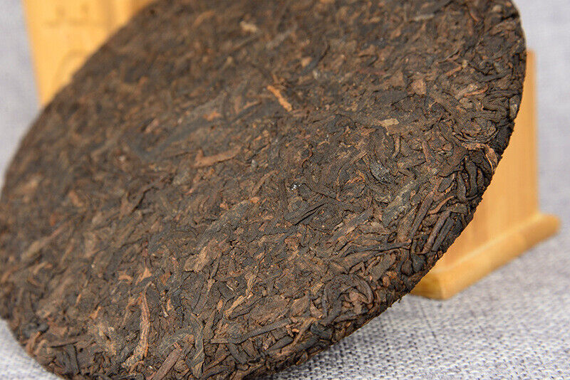 357 g Yunnan deep mountain wild flavor cooked cake seven sub cake Pu'er tea