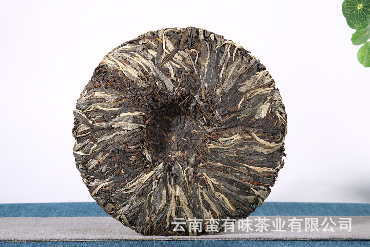 357g Yunnan Pu'er tea leaves Menghai Da Shu tea Putzi tea cake Pu'er raw tea