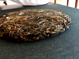 357g Pu'er raw tea golden leaves golden Mengku yellow slices, seven seed cakes