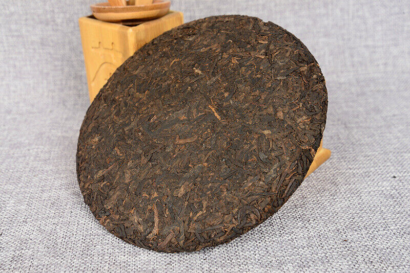 357 g Yunnan deep mountain wild flavor cooked cake seven sub cake Pu'er tea