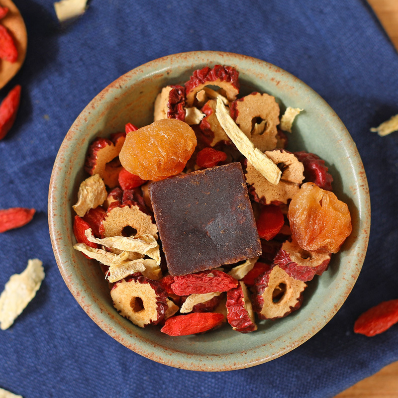 Brown sugar ginger tea longan jujube goji berry black sugar ginger jujube tea