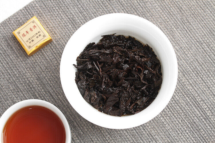 Menghai Pu'er ripe tea small square brick tea leaves sinensis word Pu'er tuocha