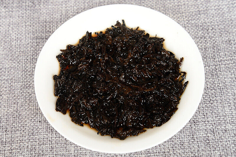 357 g Yunnan deep mountain wild flavor cooked cake seven sub cake Pu'er tea