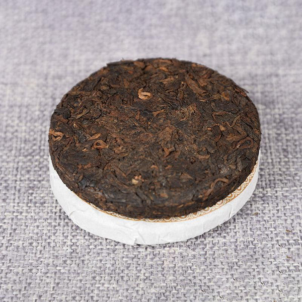 50g Premium Grade Yunnan Yiwu Pu'er Cake: Orchid Fragrance Sealed Packaging