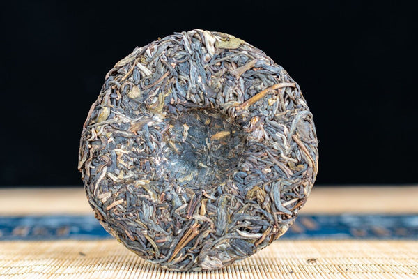 100g Pu'er Raw Tea Iceland Yunnan Ancient Tea Spring Tea Cake Orchid Fragrance