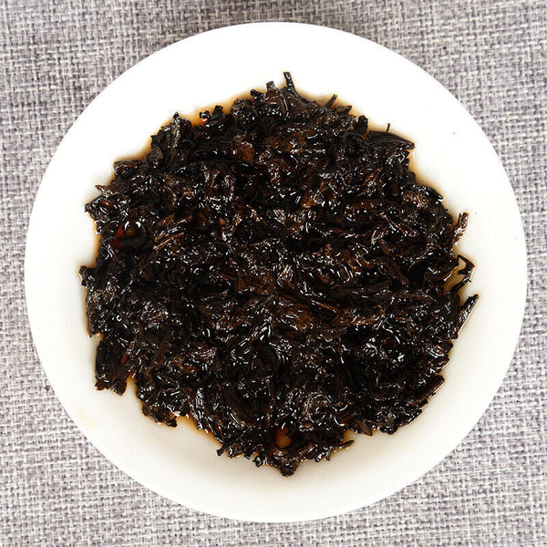 357 g Yunnan deep mountain wild flavor cooked cake seven sub cake Pu'er tea