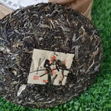 2013 Nannuoshan Raw Pu-erh Tea Cake Aged Puer Cake Tea Yunnan Puerh Raw Tea 357g