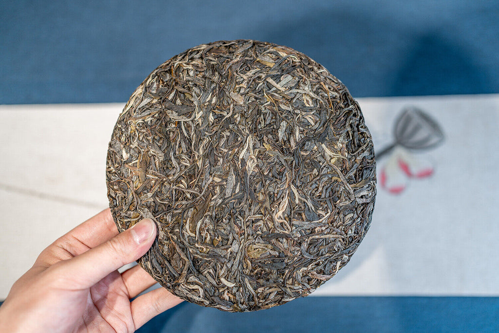 357g DaXueshan Pu'er Raw Tea Yunnan First Spring Ancient Seven Seed Cake Tea