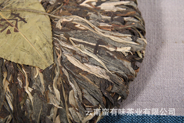 357g Yunnan Pu'er tea leaves Menghai Da Shu tea Putzi tea cake Pu'er raw tea