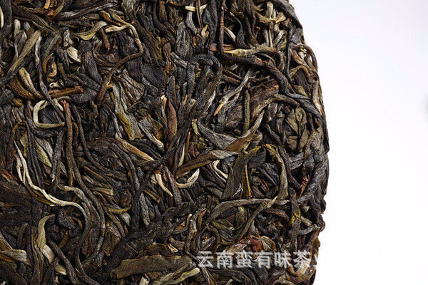 357g Yunnan Pu'er Tea Da Xueshan Early Spring Ancient Raw Tea Seven Seed Cake