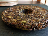 357g Pu'er raw tea golden leaves golden Mengku yellow slices, seven seed cakes