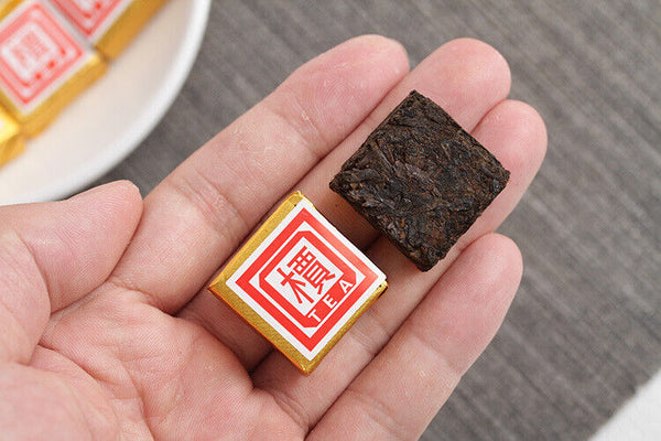 Menghai Pu'er ripe tea small square brick tea leaves sinensis word Pu'er tuocha