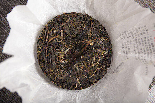 Yunnan Pu'er tea 50g small Icelandic raw tea cake seven cakes small cake tea