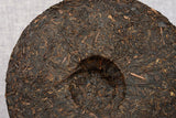 357 g Yunnan deep mountain wild flavor cooked cake seven sub cake Pu'er tea