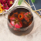 Dark plum hawthorn lotus leaf tea flowers and plants cold brewed tangerine tea