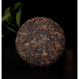 Bajiaoting Valley Flower TeaChaPu'er KONG QUE ZHI XIANG QI ZI BING 357g