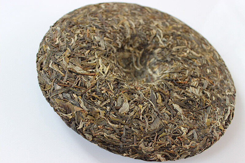 Xigui Raw Tea Yunnan Puerh Tea Seven Cakes 357g