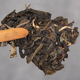 Aged Raw Tea Yunnan Nannuoshan Arbor Qizi Round Tea Cake 357g