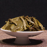 High-Quality Additive-Free Yunnan Tea Tree King Raw Pu'er Tea Gua Feng Zhai 357g