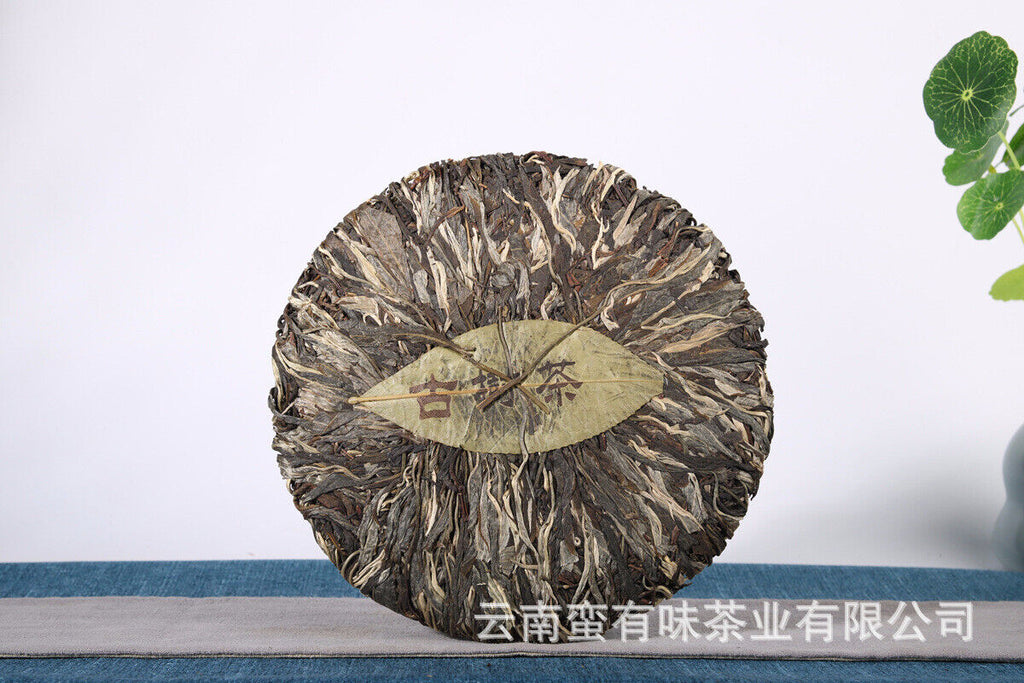 357g Yunnan Pu'er tea leaves Menghai Da Shu tea Putzi tea cake Pu'er raw tea