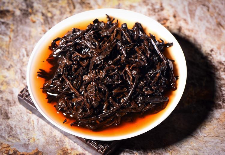 Yunnan Pu-erh Tee Pu'er Reifer Tee Jinmao Gong Kuchen Brown Tree Old Tea Kuchen