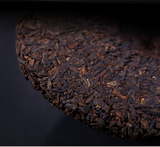 357g Yiku Xigui First Spring Ancient Large Leaf Seeds Aged Pu'er Ripe Cake Tea