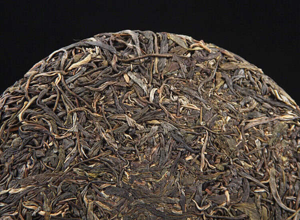 Yunnan Menghai Pu'er Raw Tea Cake Black Tea 357g 易武高山青饼