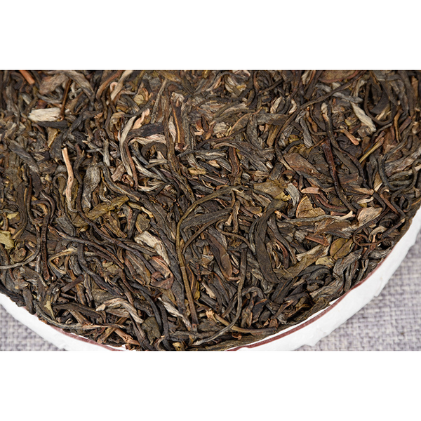 Yiwu Fenghuang Wo Seven Seeds Cake Spring Tea Organic Green Tea Tea Cake 357g