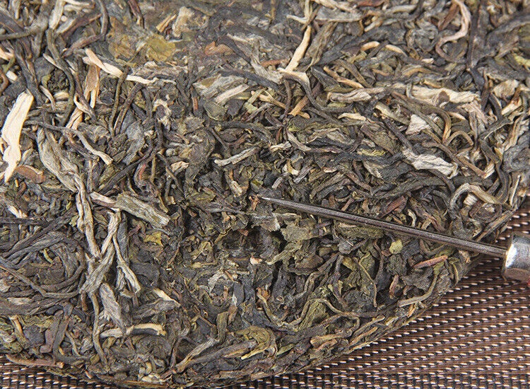 Icelandic raw tea cake spring tea pure sweet Mengku Pu'er seven seed cake tea