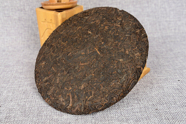 357 g Yunnan deep mountain wild flavor cooked cake seven sub cake Pu'er tea