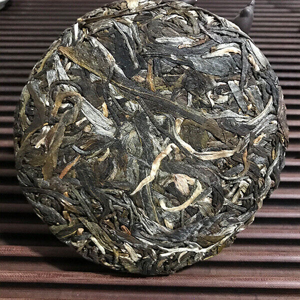 100g Yunnan Pu-erh Raw Tea Icelandic Raw Tea Cake Healthy Drink Secondary image