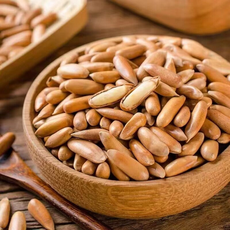 Hand-peeled pine nuts New Brazilian pine nuts Long grain large granular snack Main image