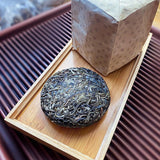 100g - Xi Gui Raw Tea with Orchid Aroma Yunnan Pu-erh Tea Cake