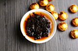 75g 15pcs/box Yunnan Nuo Xiang Tuo tea boxed Pu'er Tuo tea Nuo Xiang Tuo tea