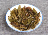 Aged Raw Tea Yunnan Nannuoshan Arbor Qizi Round Tea Cake 357g