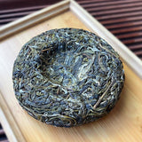 100g - Xi Gui Raw Tea with Orchid Aroma Yunnan Pu-erh Tea Cake