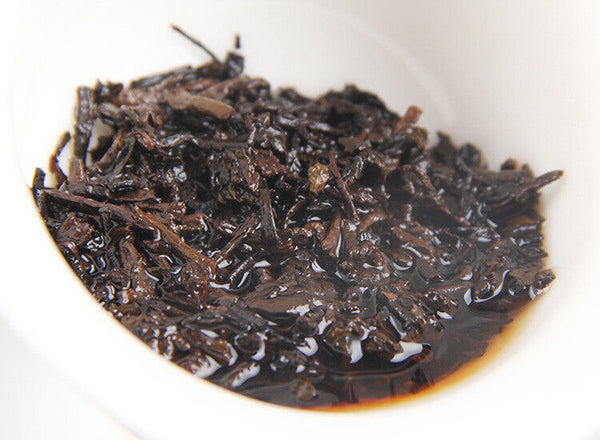 Long Yuan No. Pu'er Ripe Tea Cake Ancient Tree Yunnan Seven Seeds Cake 380g/cake