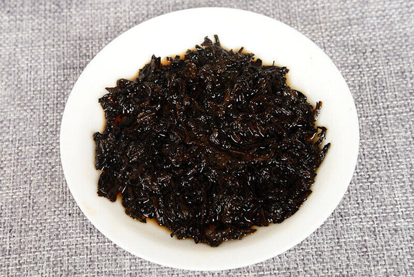 357 g Yunnan deep mountain wild flavor cooked cake seven sub cake Pu'er tea
