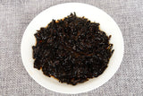 357 g Yunnan deep mountain wild flavor cooked cake seven sub cake Pu'er tea