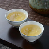 100g - Xi Gui Raw Tea with Orchid Aroma Yunnan Pu-erh Tea Cake